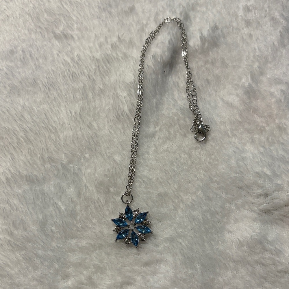 Elegant Silver and Blue Starburst Necklace